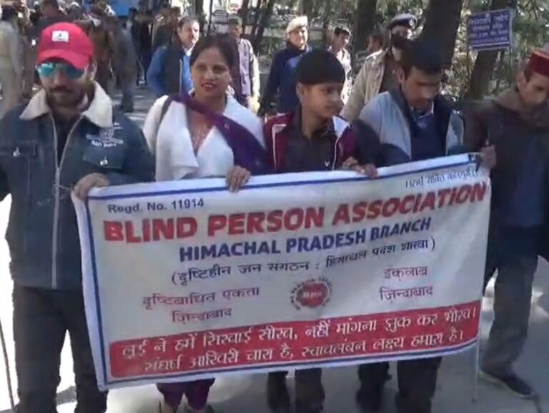 Visually impaired association members march from Secretariat to CM Residence